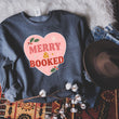 Load image into Gallery viewer, "Merry & Booked" Cozy Christmas Sweatshirt
