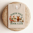 Load image into Gallery viewer, "North Pole Book Club" Christmas Tee