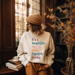 Load image into Gallery viewer, "It's a Beautiful Day to Read Banned Books" Reader's Sweatshirt