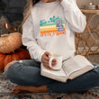 Load image into Gallery viewer, "Take a Look, It's in a Book" Retro Book Lover's Unisex Sweatshirt